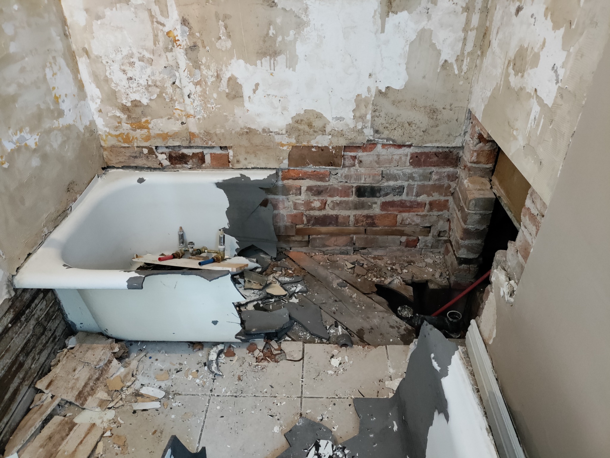 Shower tub tearout and bathroom demo in Utah remodel