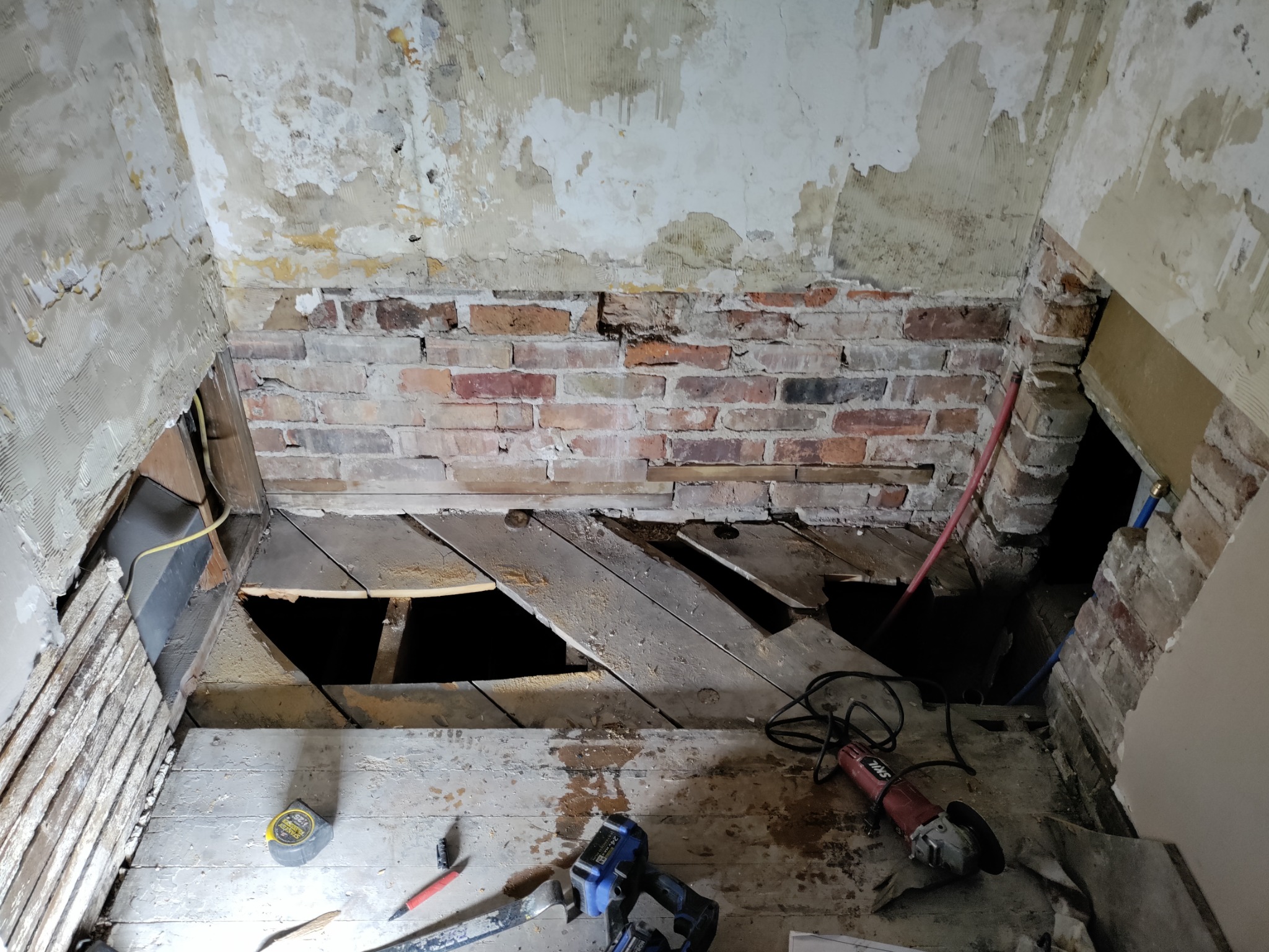 Open shower floor and wall damage during Utah shower remodel
