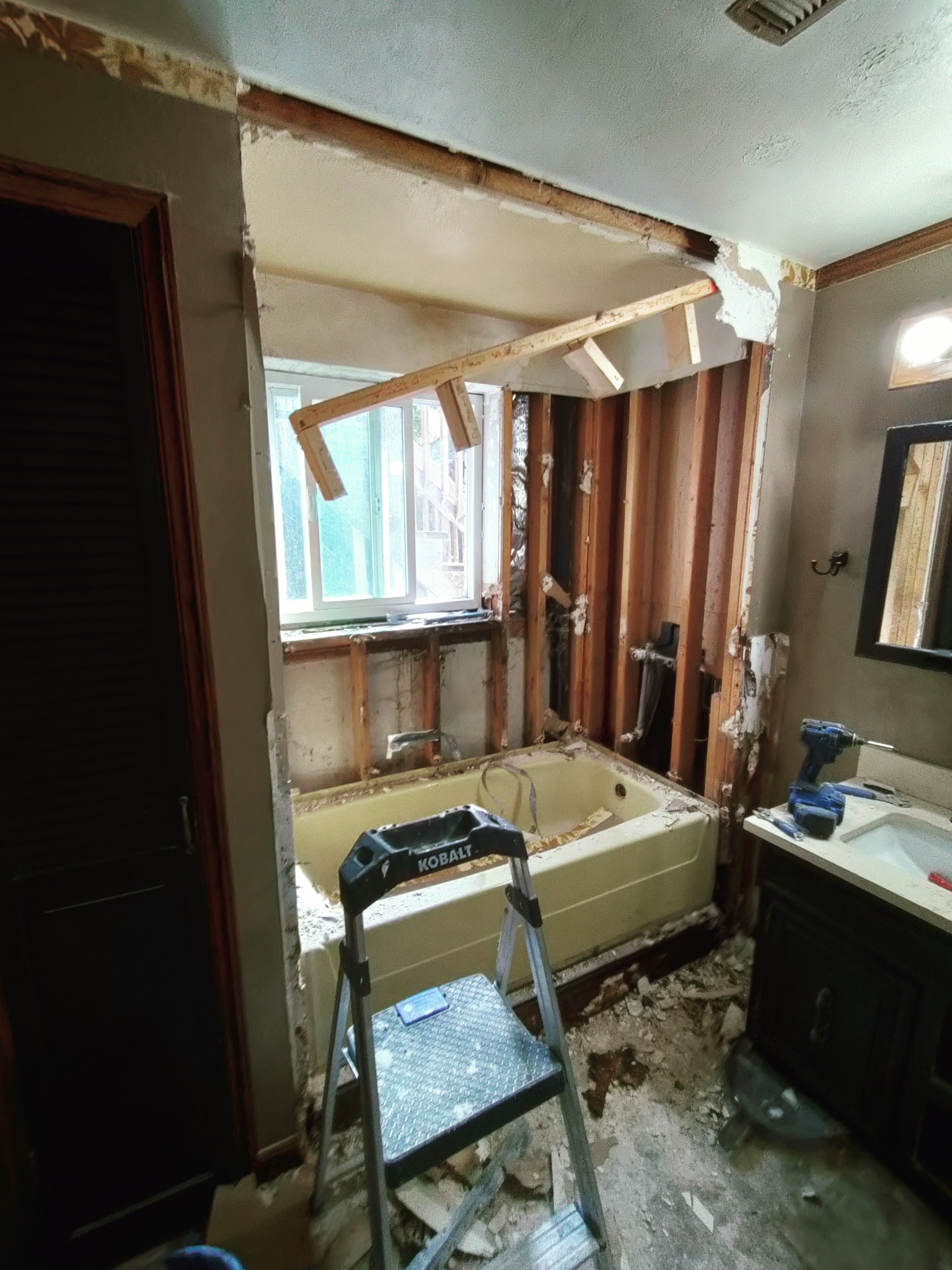 Bathtub removal demo during Utah tub to shower conversion