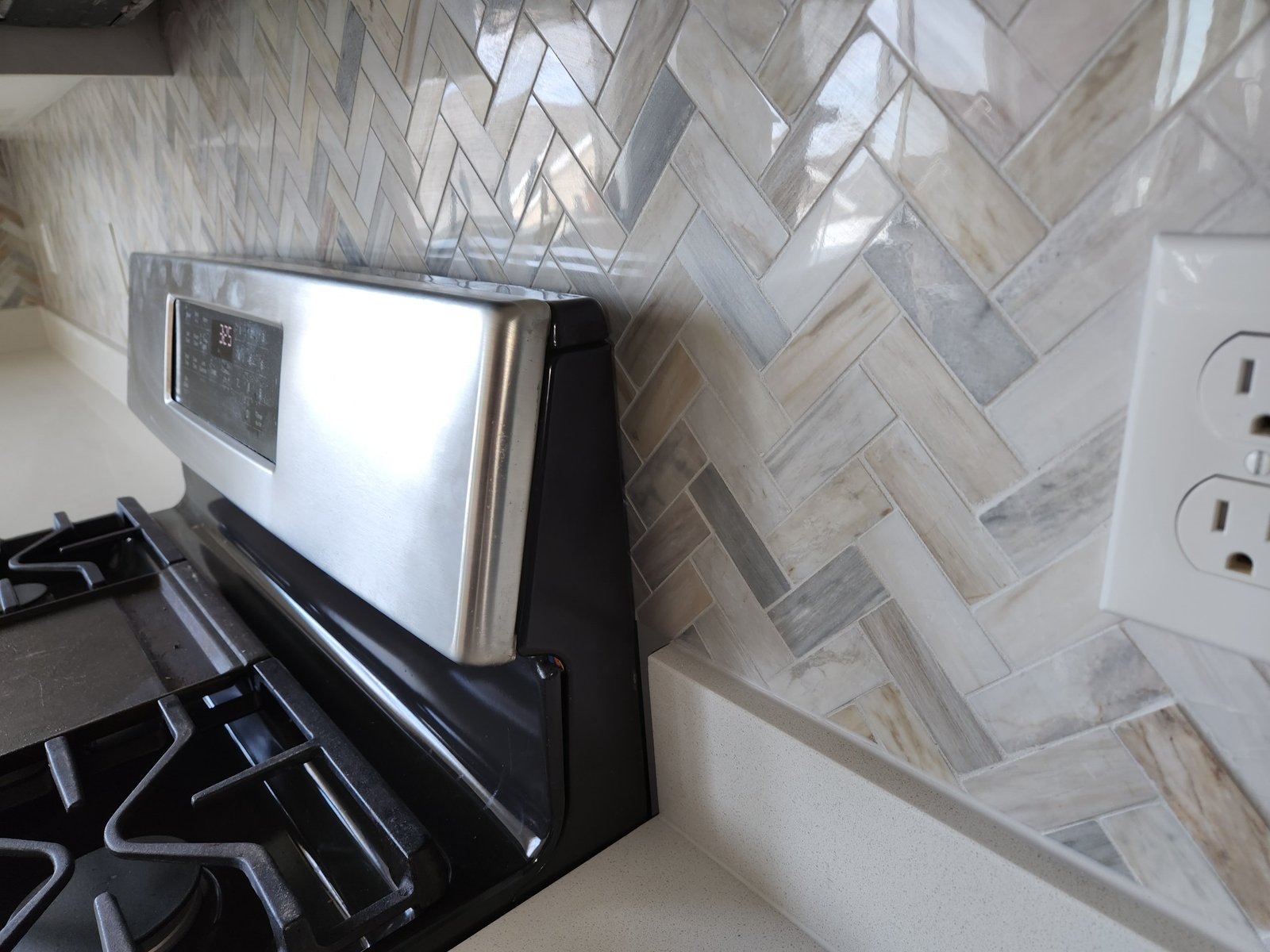 Kitchen backsplash herringbone tile design