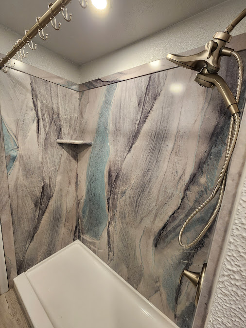 Sentrel solid surface shower system installation West Valley City Utah rental ADU
